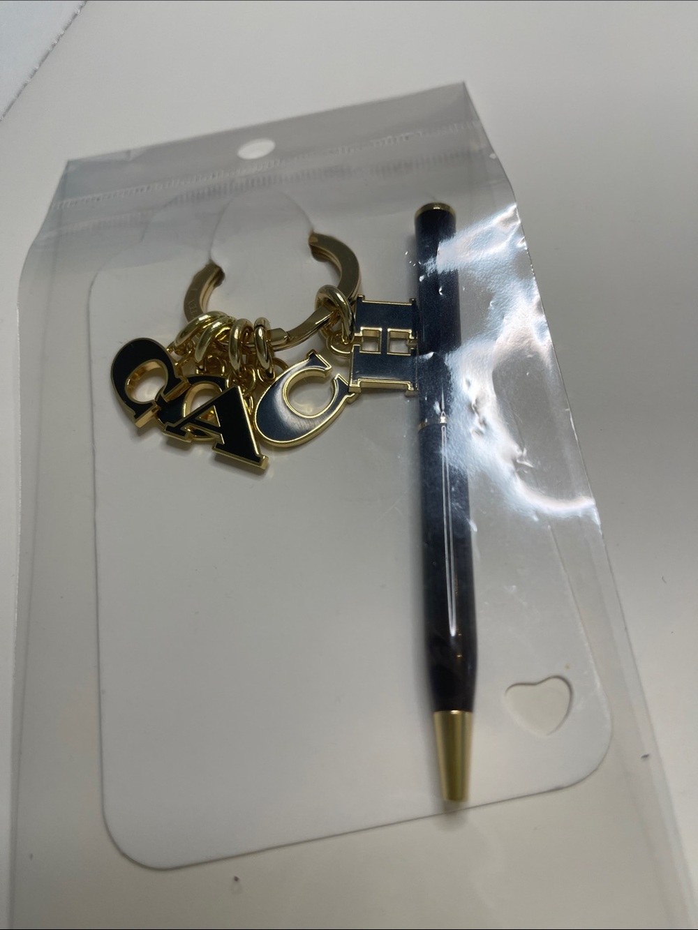 (2) COACH Black and Gold Charm Keyring and (2) hot pink Coach Pens - Picture 8 of 8